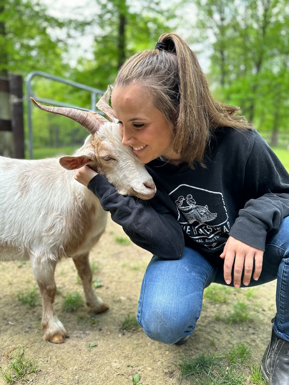 a woman with rescue animals